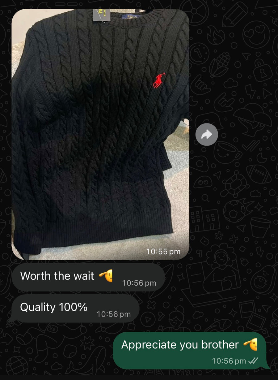 LAYERD customer review showing a black cable-knit sweater