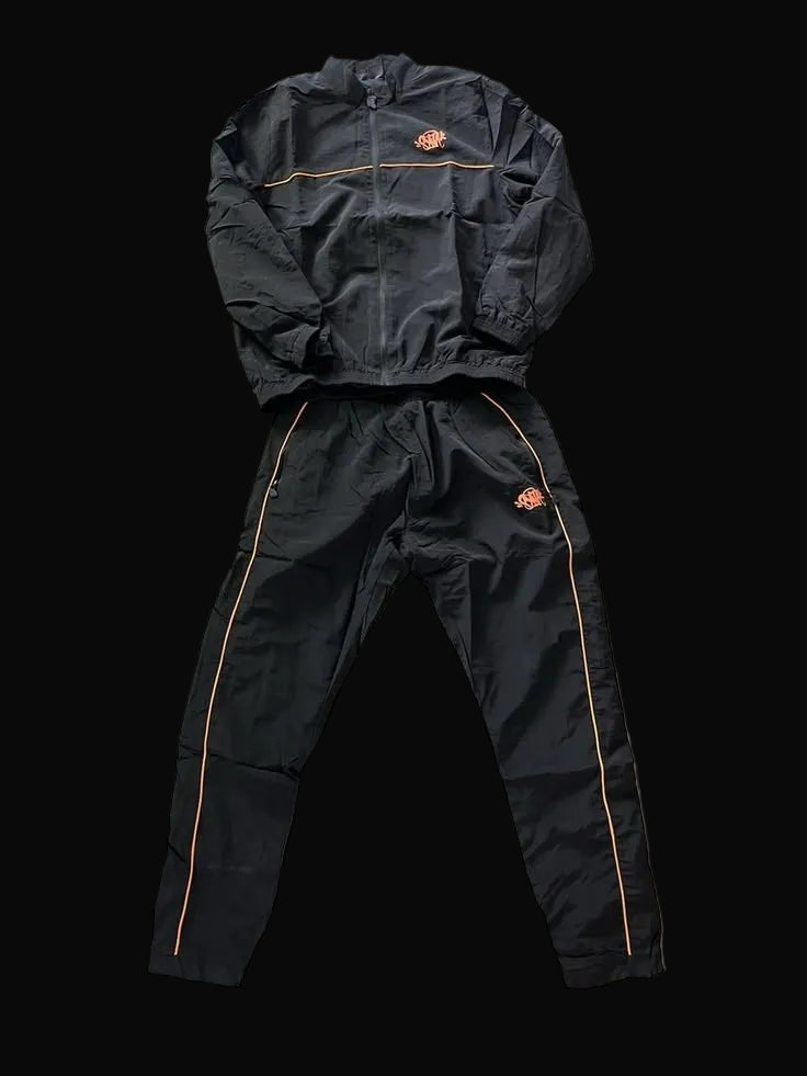 Syna World Shell Tracksuit “BLACK/ORANGE”